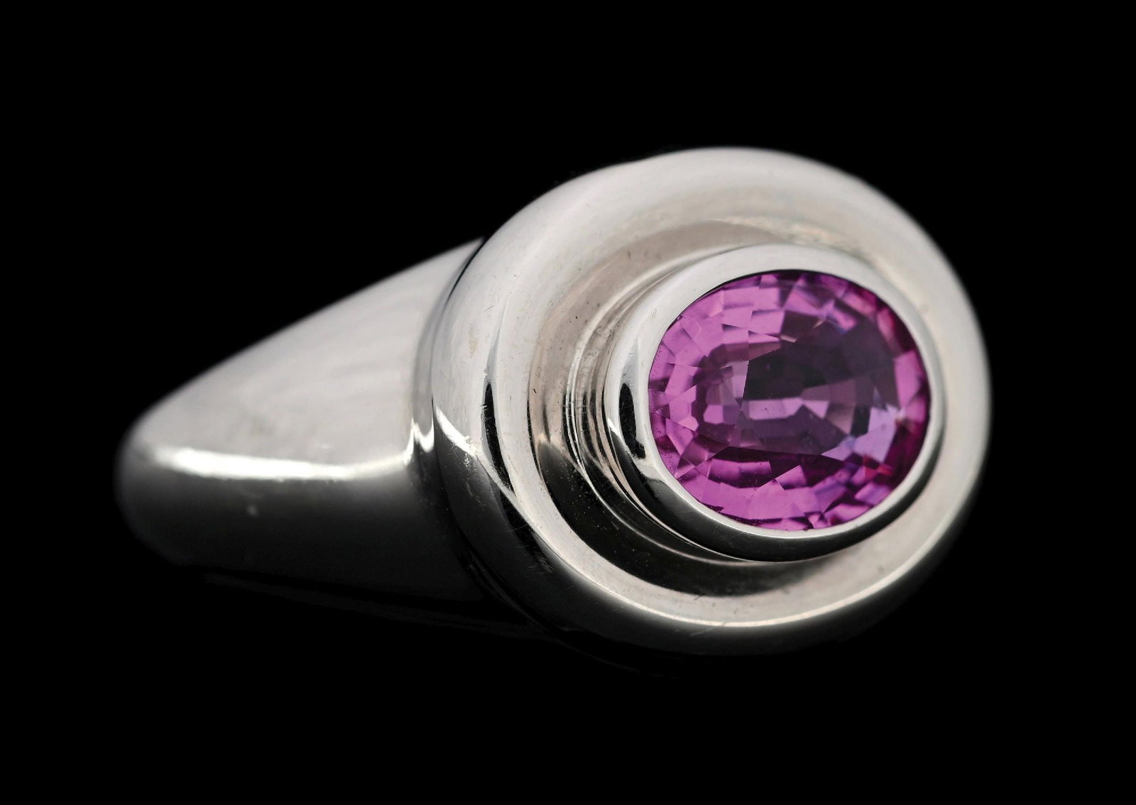 18K WHITE GOLD TIFFANY & CO PINK SAPPHIRE RING DESIGNED BY PALOMA PICASSO: 18k white gold Paloma Picasso for Tiffany & Co. pink sapphire ring set with 1 oval cut pink sapphire (9x7) with an estimated weight 2.50cts. Width at top measures 14mm. Finger size 6-1/2. Gross weight