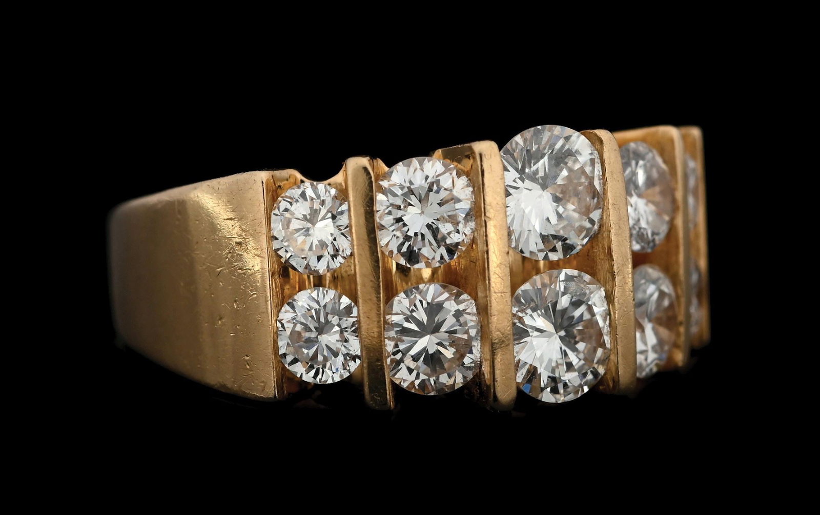 14K YELLOW GOLD 2-ROW 2CT TW DIAMOND RING: 14k yellow gold 2-row graduated diamond (2.00ctw) band. Ring size 6-1/4. Width at top measures 9mm. Gross weight is 7.5 grams. Marked "14K". Condition: (Very Good-Excellent).