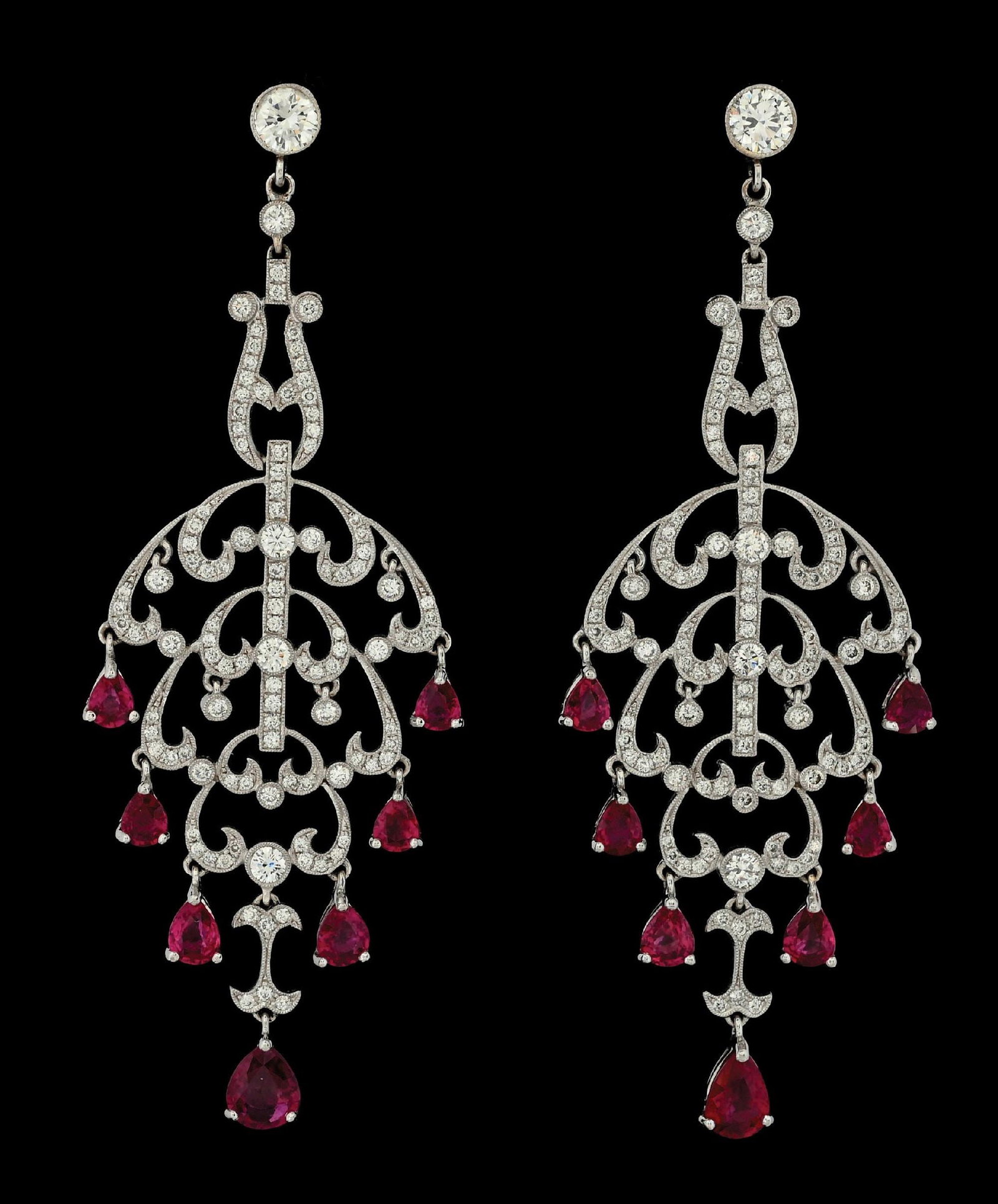 18K WHITE GOLD RUBY & DIAMOND EARRINGS W/GIA REPORTS: 18k white gold ruby (14 pears @ 5.00ctw) and diamond (115 rounds @ 2.00ctw) chandelier earrings accompanied by two original GIA ruby reports. (See additional website images for report