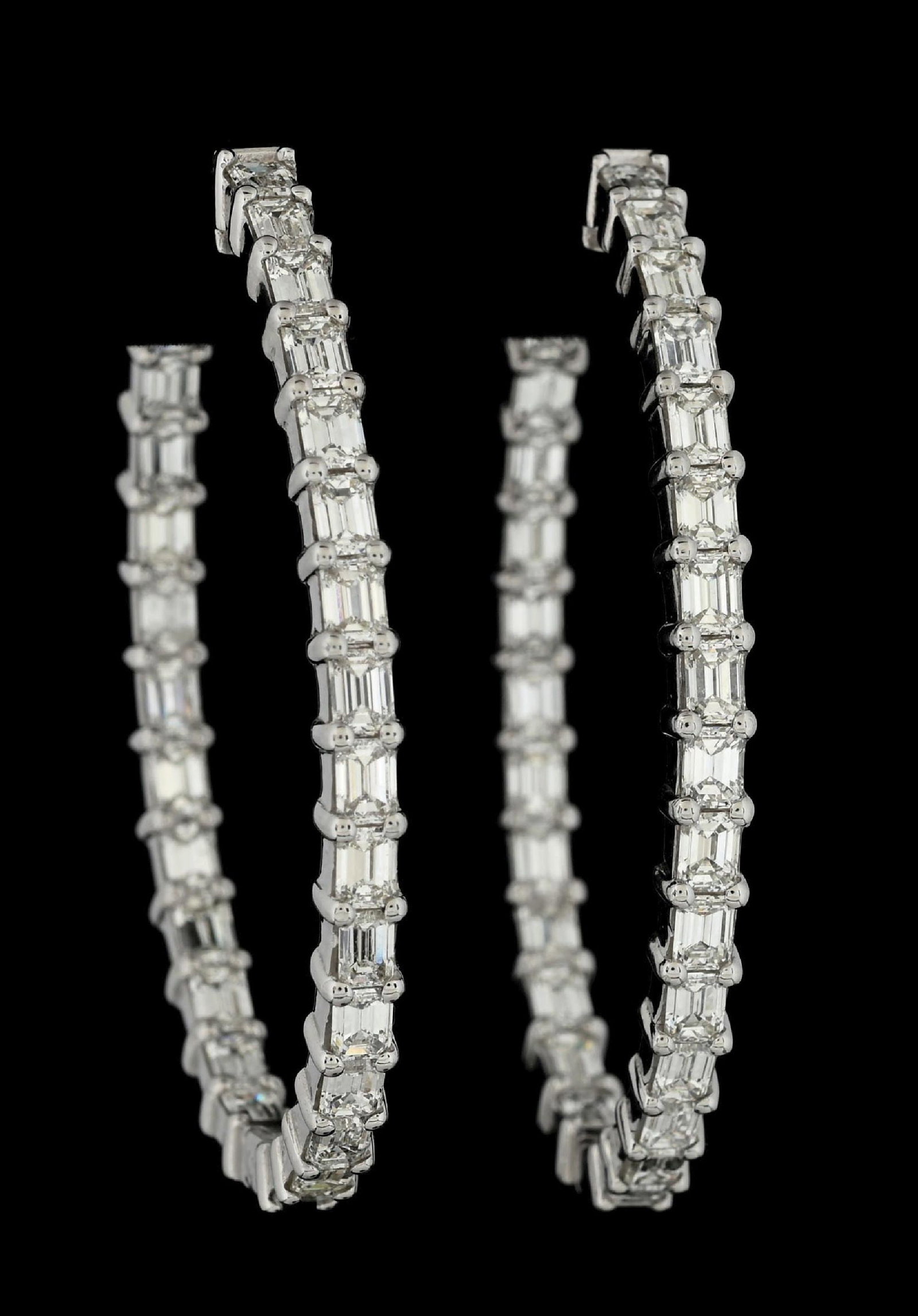 PLATINUM DIAMOND INSIDE/OUTSIDE HOOP EARRINGS, 8.52CT TW: Platinum and diamond inside/outside hoop earrings consisting of 56 emerald cut near-colorless natural diamonds with a total weight of 8.52cts. Length measures 1-7/8". Width measures 4mm. Gross weight