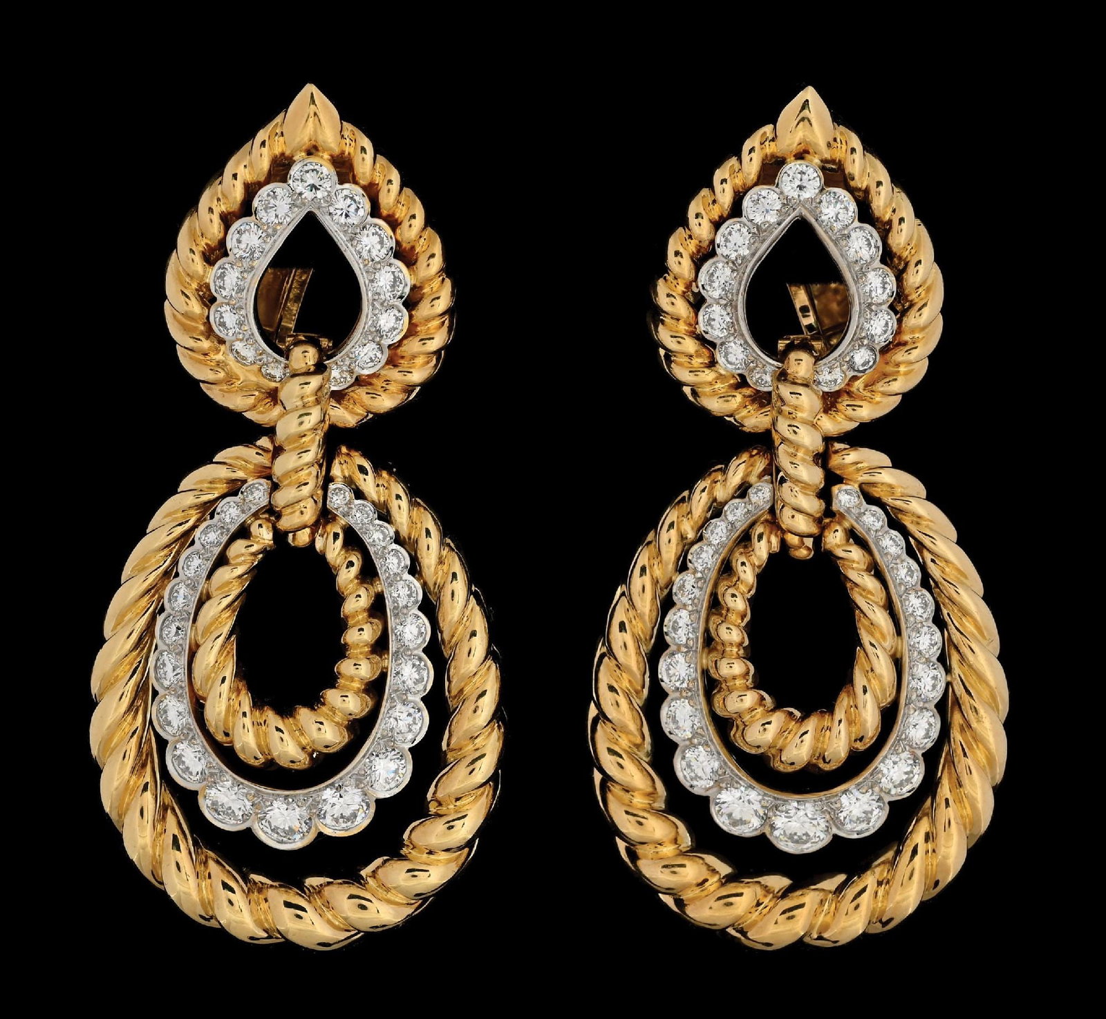 18K GOLD VAN CLEEF & ARPELS 4CT TW DIAMOND EARRINGS W/BOX: Rare and important 18k yellow and white gold Van Cleef & Arpels vintage diamond door knocker earrings in original signed case. Earrings are set with a total of 70 round brilliant cut near-colorless gr