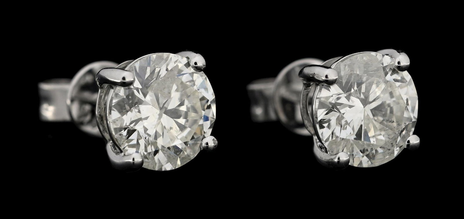 14K WHITE GOLD 2.06CT TW DIAMOND STUD EARRINGS W/REPORT: 14k white gold diamond (2.06ctw) stud earrings accompanied by an original GGA appraisal report with an ERRV of $14,580.00 (See additional website images of report for specifications). Marked "14K". Co