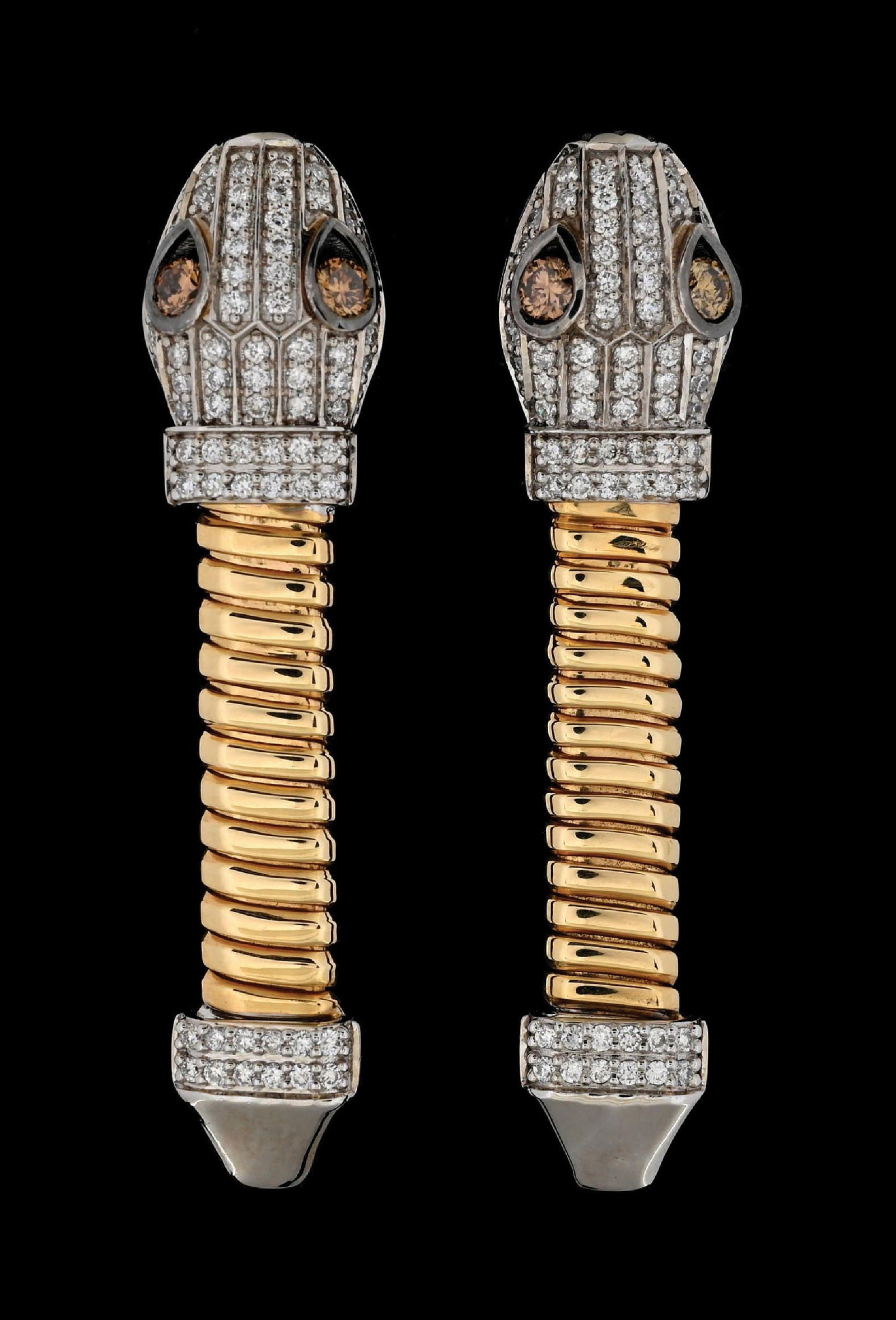 14K T/T GOLD FANCY BROWN & COLORLESS DIAMOND SNAKE EARRINGS W/REPORT: 14k two-tone, white and yellow gold diamond (1.05ctw) snake earrings accompanied by an original GGA appraisal report with an ERRV of $12,740.00 (See additional website images of report for