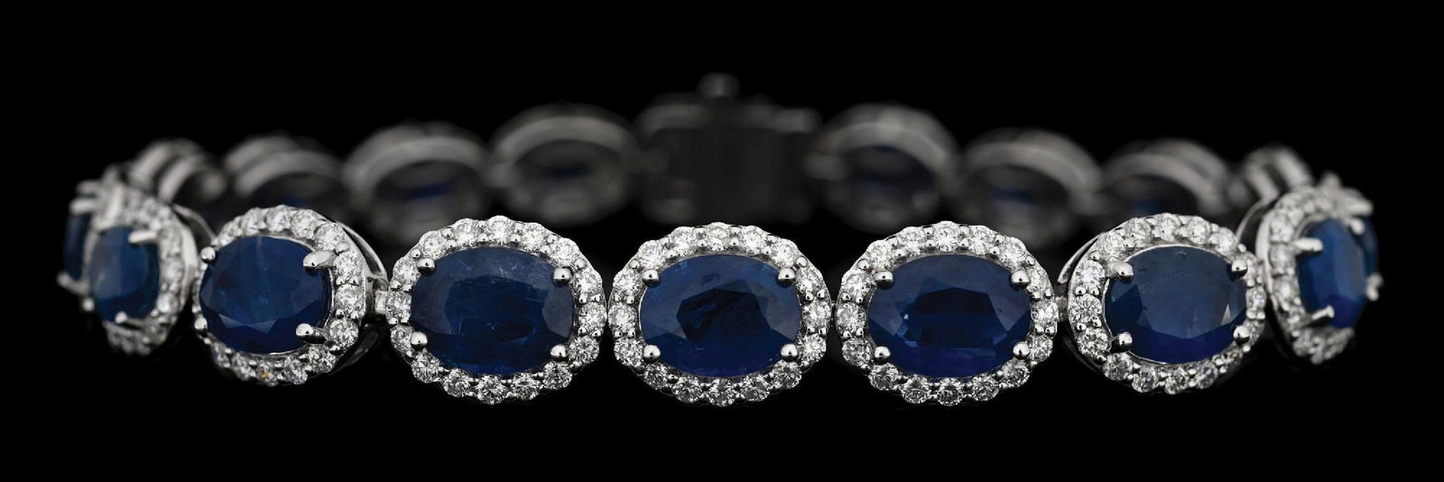 PLATINUM SAPPHIRE & DIAMOND BRACELET W/REPORT: Platinum sapphire (17.56ctw) and diamond (3.64ctw) bracelet accompanied by an original GGA appraisal report with an ERRV of $50,490.00. (See additional website images for report specifications).
