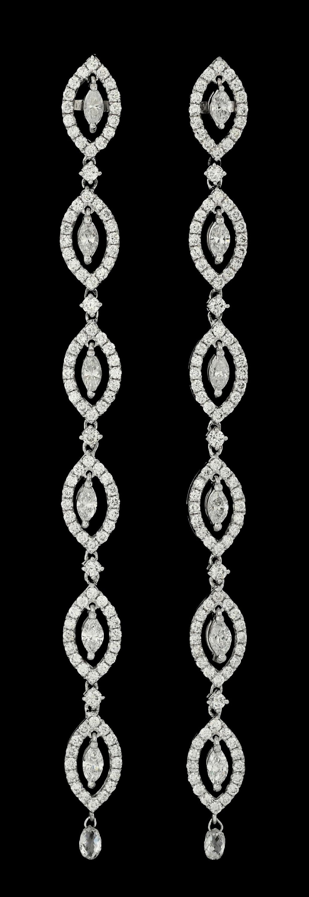 18K WHITE GOLD 4CT TW DIAMOND DROP EARRINGS: 18k white gold diamond drop earrings consisting of 216 mixed marquise cut and round brilliant cut near-colorless natural diamonds with a total weight of 4.00cts. Length measures 3-1/2". Width measures