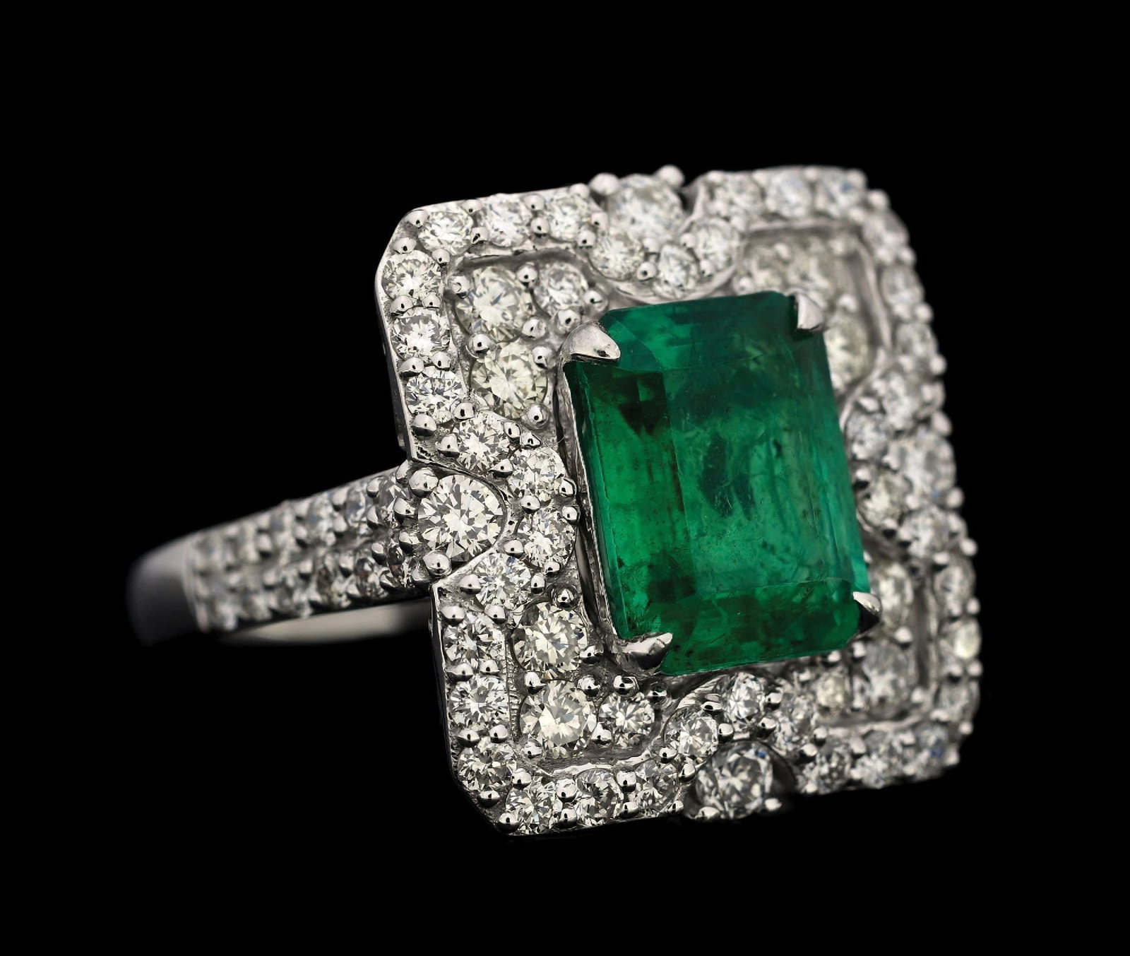 PLATINUM EMERALD & DIAMOND RING W/GIA REPORT: Platinum emerald (2.55ct) and diamond (1.39ctw) ring accompanied by an original GIA emerald report and a GGA appraisal report with an ERRV of $29,860.00. (See additional website images for report spec
