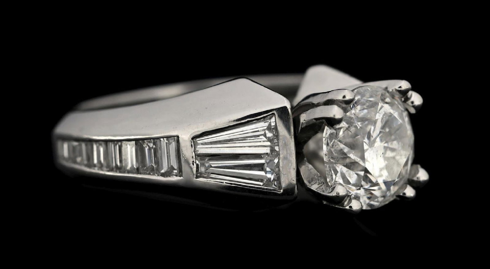 PLATINUM 3.32CT TW DIAMOND ENGAGEMENT RING W/REPORT: Platinum diamond (2.32ct center, 1.00ctw sides) engagement ring accompanied by an original GGA appraisal report with an ERRV of $45,290.00. (See additional website images for report specifications). R