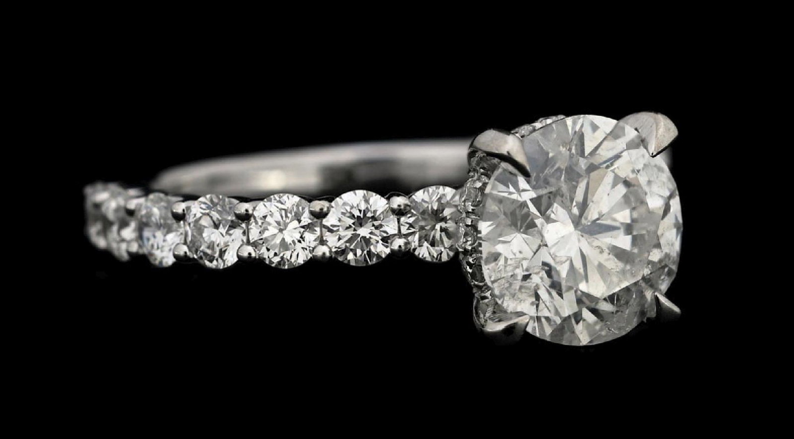 14K WHITE GOLD 3.12CT TW DIAMOND ENGAGEMENT RING W/REPORT: 14k white gold designer diamond (2.01ct center, 1.11ctw sides) engagement ring accompanied by an original GGA appraisal report with an ERRV of $34,680.00. (See additional website images for report