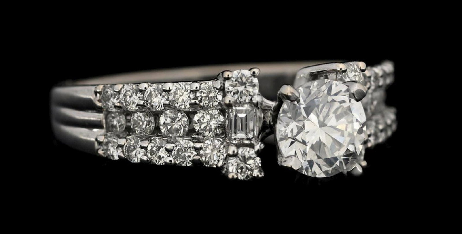 18K WHITE GOLD 1.40CT TW DIAMOND RING W/GIA REPORT: 18k white gold diamond (0.73ct center, 0.67ctw sides) engagement ring accompanied by an original GIA diamond grading report and an AIGL appraisal report with an ERRV of $9,877.00. (See additional webs