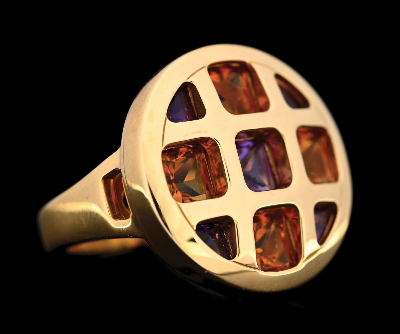 18K YELLOW GOLD CARTIER PASHA AMETHYST & CITRINE RING: 18k yellow gold Cartier Pasha amethyst and citrine ring. Finger size (54) 6-3/4 but with 2 sizing beads installed inside shank. Width at top measures 20mm. Gross weight is 15.9 grams. Marked "Cartier 