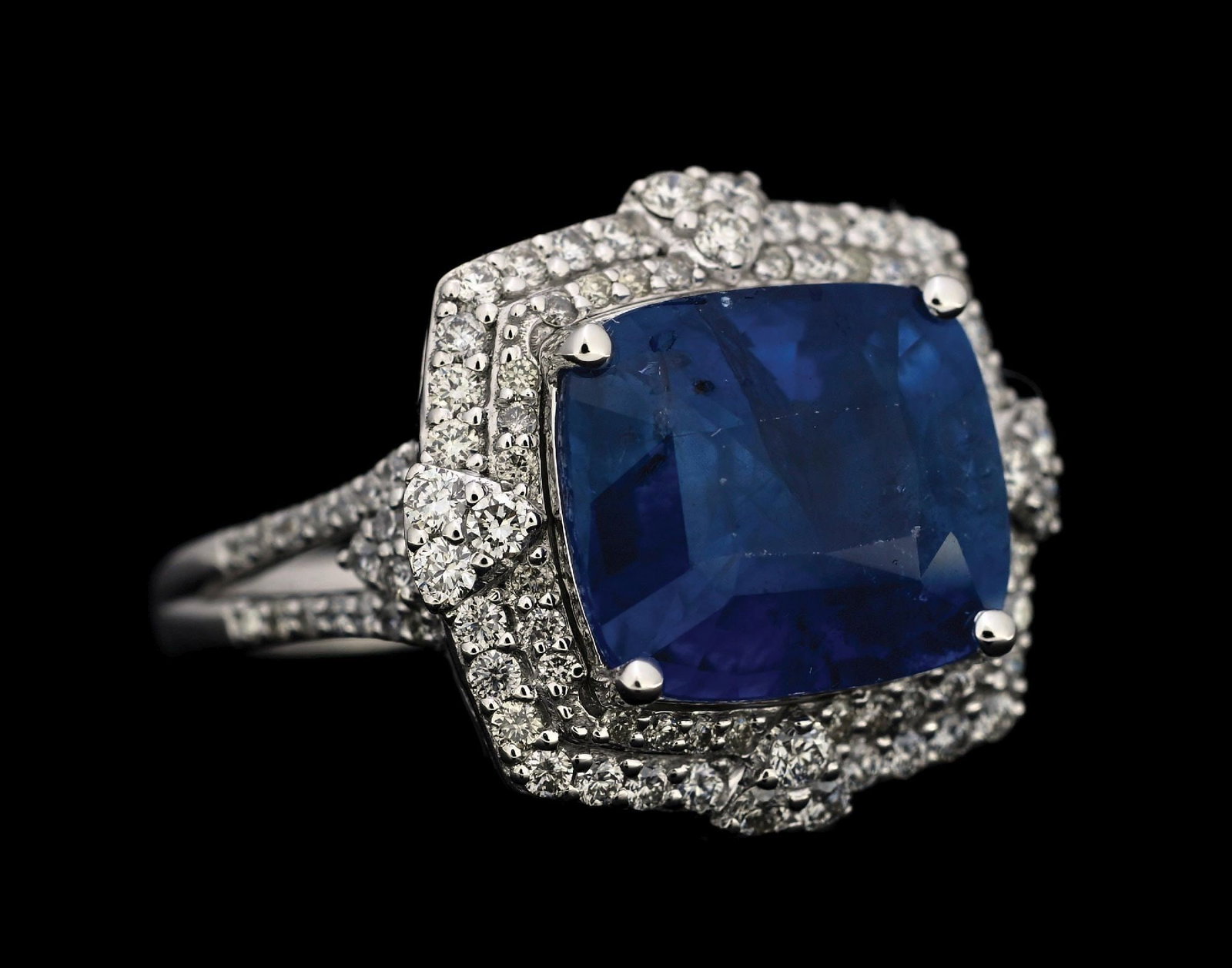 PLATINUM SAPPHIRE & DIAMOND RING W/GIA REPORT: Platinum sapphire (7.86ct) and diamond (0.84ctw) ring accompanied by an original GIA sapphire report and a GGA appraisal report with an ERRV of $51,820.00. (See additional website images for report sp