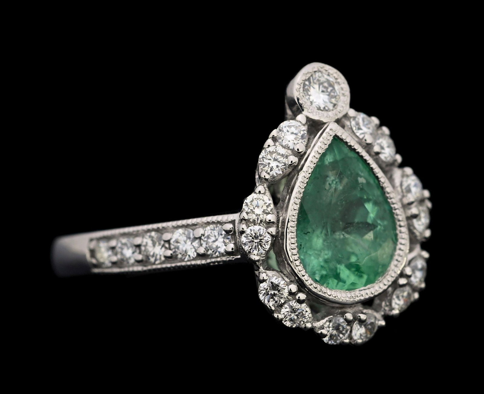 PLATINUM PARAIBA TOURMALINE & DIAMOND RING W/GIA REPORT: Platinum Paraiba tourmaline (1.32ct) and diamond (0.45ctw) ring accompanied by an original GIA tourmaline report and a GGA appraisal report with an ERRV of $17,260.00. (See additional website images f