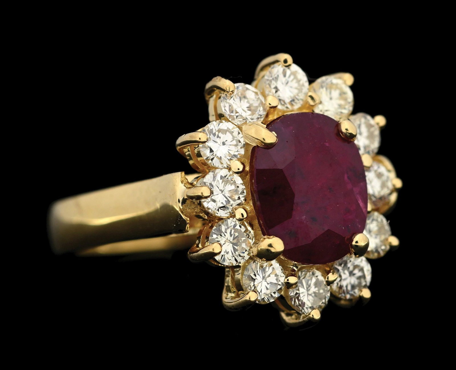 18K YELLOW GOLD RUBY & DIAMOND RING W/REPORT: 18k yellow gold ruby (2.26ct) and diamond (1.20ctw) ring accompanied by an original GGA appraisal report with an ERRV of $18,630.00. (See additional website images for report specifications). Ring siz