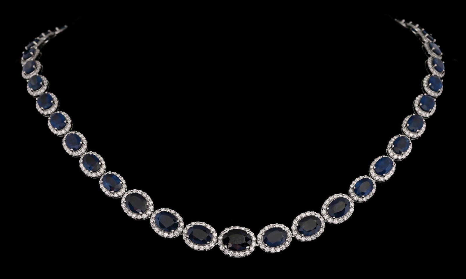 14K WHITE GOLD SAPPHIRE & DIAMOND NECKLACE: 14k white gold sapphire (40.72ctw) and diamond (6.90ctw) necklace accompanied by an original GGA appraisal report with an ERRV of $91,820.00. (See additional website images for report specifications).