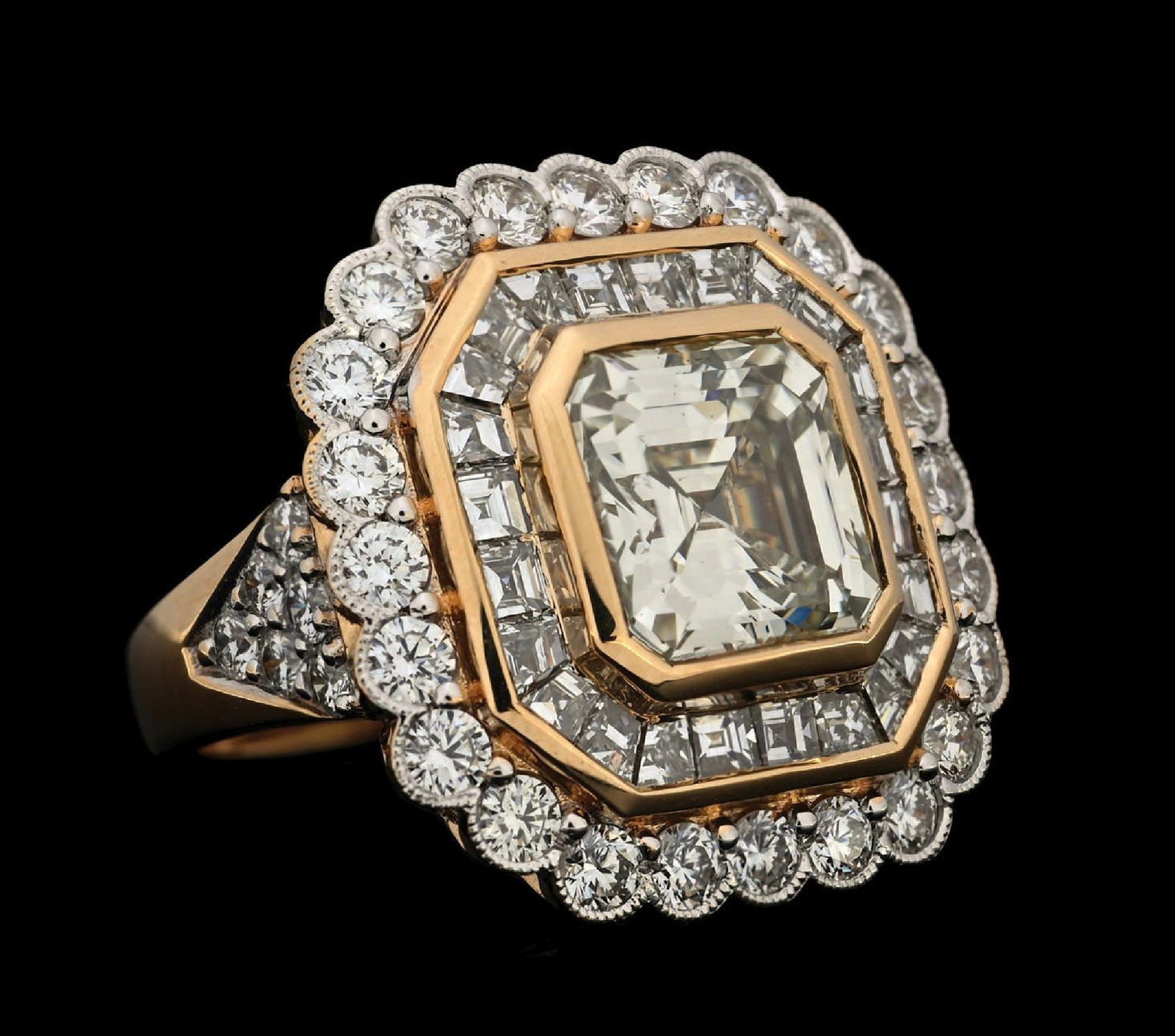 18K YELLOW GOLD 7.30CT TW DIAMOND RING W/REPORT: 18k yellow gold diamond (4.05ct center, 3.25ctw sides) engagement ring accompanied by an original AJI appraisal report with an ERRV of $62,000.00. (See additional website images for report specificati
