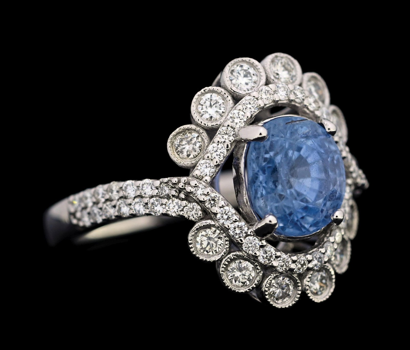 PLATINUM CEYLON SAPPHIRE & DIAMOND RING W/GIA REPORT: Platinum Ceylon sapphire (3.03ct) and diamond (0.73ctw) ring accompanied by an original GIA sapphire report and an AIGL appraisal report with an ERRV of $27,106.00. (See additional website images for