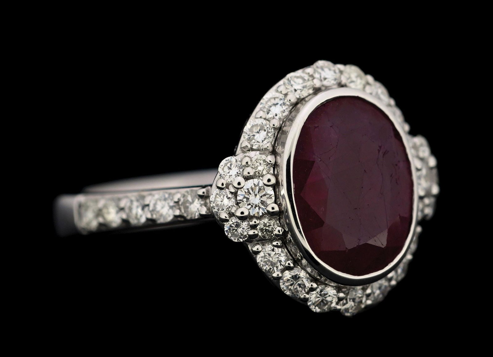 PLATINUM EAST AFRICAN RUBY & DIAMOND RING W/GIA REPORT: Platinum East Africa ruby (3.30ct) and diamond (0.61ctw) ring accompanied by an original GIA ruby origin report and a GGA appraisal report with an ERRV of $18,930.00. (See additional website images fo