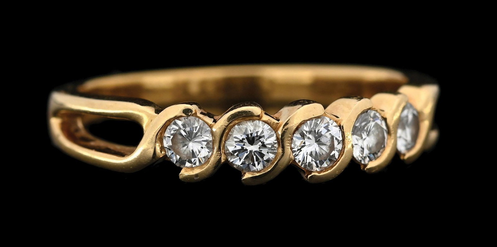 18K YELLOW GOLD TIFFANY & CO DIAMOND WEDDING BAND: 18k yellow gold Tiffany & Co. diamond wedding band consisting of 5 round brilliant cut natural diamonds with a total weight of 0.45cts. Width at top measures 4.5mm. Finger size 8. Gross weight is 3.4