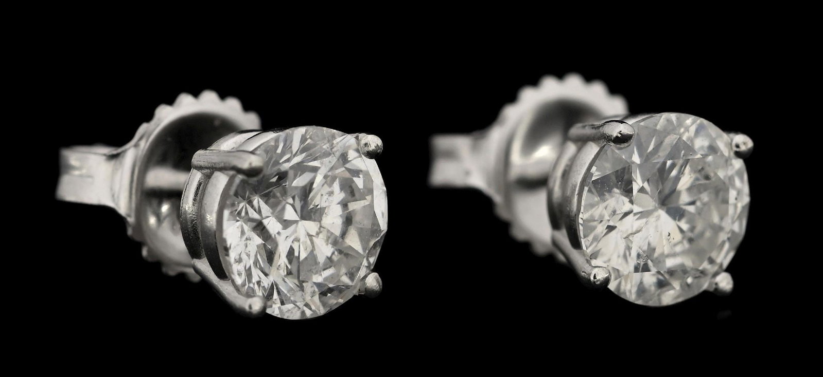14K WHITE GOLD 2.03CT TW DIAMOND STUD EARRINGS W/REPORT: 14k white gold diamond (2.03ctw) stud earrings accompanied by an original GGA appraisal report with an ERRV of $15,390.00. (See additional website images for report specifications). Width measures 6.2