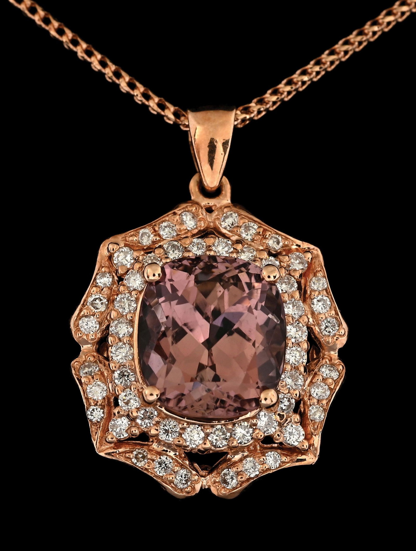 14K ROSE GOLD PINK TOURMALINE & DIAMOND NECKLACE: 14k rose gold cushion cut pink tourmaline (3.90cts) and round diamond (52 @ 1.02ctw) pendant with chain. Length measures 18" plus 1" drop pendant. Pendant width measures 18mm. Gross weight is 8.4 gram