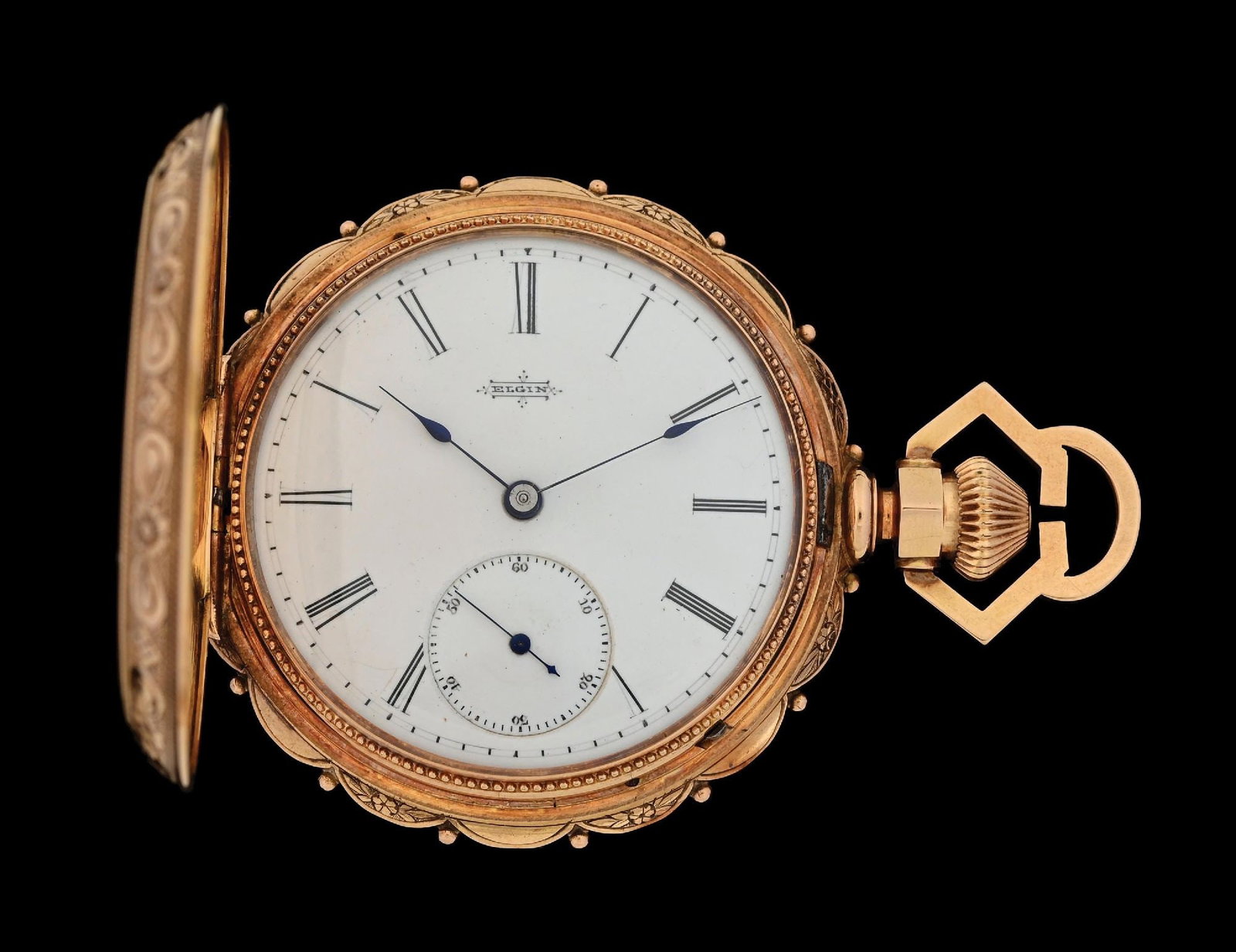 14K YELLOW GOLD ELGIN SCALLOPED H/C POCKET WATCH W/FANCY BOW: Stunning 14k yellow gold Elgin Grade 65 scalloped hunting cased pocket watch with rare fancy bow and angular crown. Case is beautifully hand engraved and decorated. Case diameter measures 44mm. Moveme