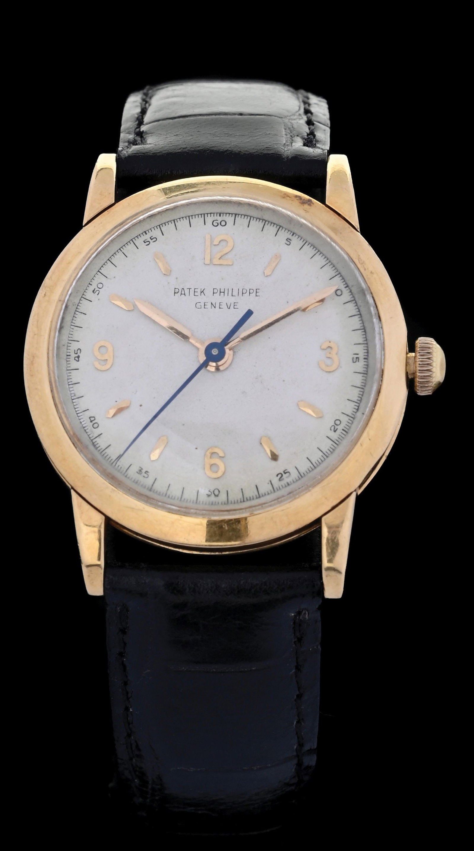 PATEK PHILLIPE CALATRAVA WRISTWATCH, REF. 2466: Patek Philippe 33mm Calatrava, Reference 2466, in solid 18k yellow gold with sweeping center seconds. Silvered dial finished with applied gold hour markers, gold hour and minute hands and blued steel 