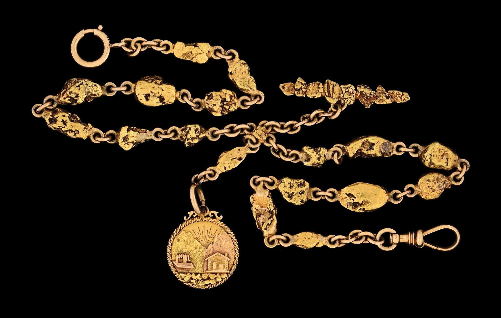 14K YELLOW GOLD & NATURAL NUGGET POCKET WATCH CHAIN W/ALASKA FOB: 14k yellow gold and natural gold nugget pocket chain with 14k multi-color Alaska gold rush circular charm/fob. Nugget chain measures 17" in length, with a gross weight of 74.4 grams including all find