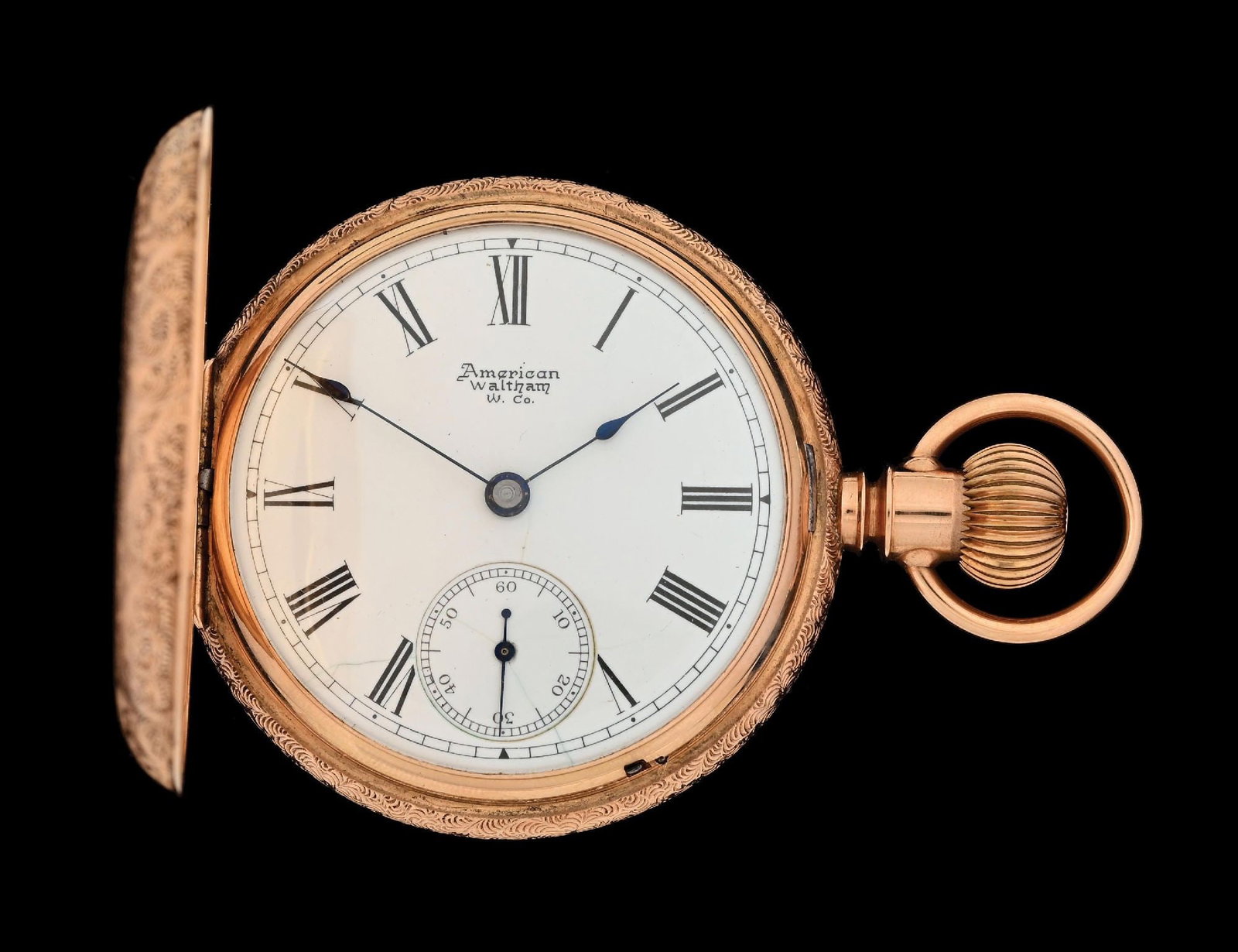 14K YELLOW GOLD WALTHAM H/C POCKET WATCH: 14k yellow gold Waltham Grade 3 hunting cased pocket watch decorated with hand engraved flowers. Rear cover with scenic buildings. Cuvette engraved with modern presentation. Case diameter measures 54m