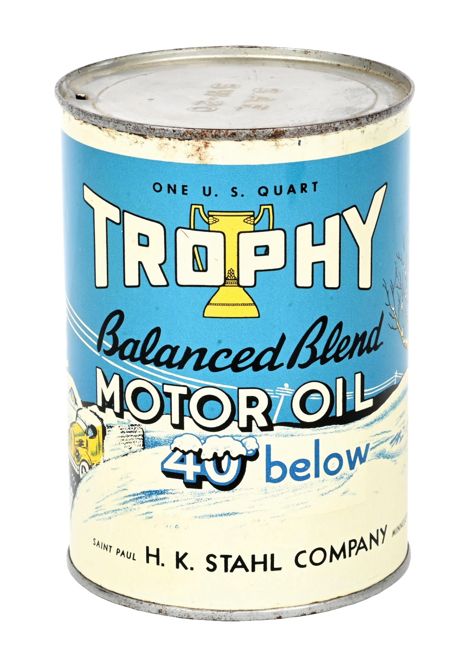 TROPHY MOTOR OIL ONE QUART CAN W/ TRUCK & WINTER GRAPHIC.: One Quart Can. C. 1940s. The H.K. Stahl Company, St, Paul, Minnesota. CONDITION: Can shows outstanding color & gloss throughout with excellent graphics and outstanding condition fields. Very light wea