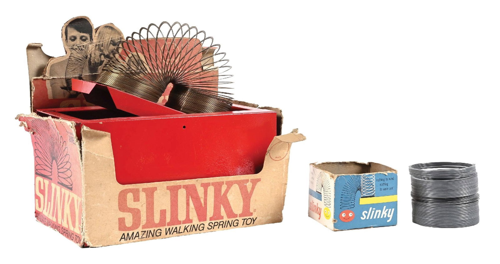 SLINKY METAL STORE DISPLAY W/ BOX & EXTRA SLINKY: C. 1960s. CONDITION: Display is in very good condition, showing excellent original paint with light general wear. Slinky display shows electrical plug and articulated side to side. Original cardstock 