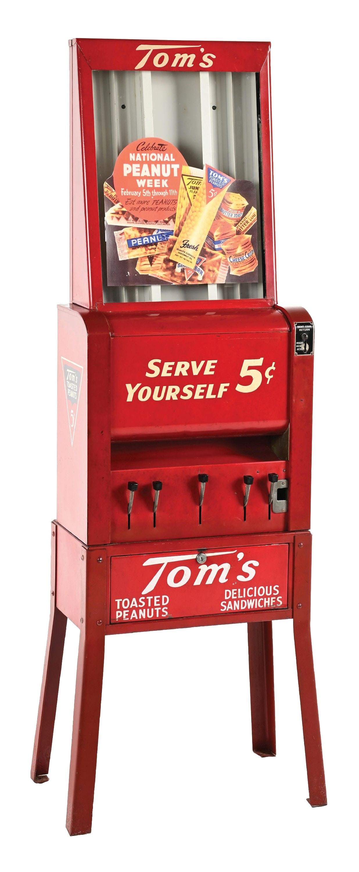 TOMS 5¢ TOASTED PEANUTS VENDING MACHINE: C. 1950s. Original with keys. CONDITION: Excellent displaying condition showing minor wear throughout giving the piece a great original patina. Paper display in the interior mounted to glass displays 