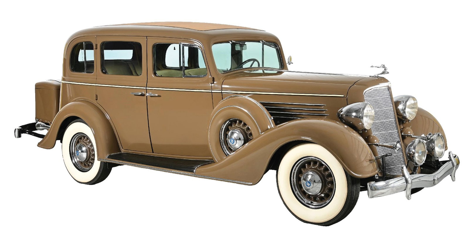1934 BUICK MODEL 57 SEDAN: This exceptionally well-documented 1934 Buick Model 57 combines elegant Art Deco styling with an extensive award history and an impressive selection of period equipment. Its Fisher body tag identifies