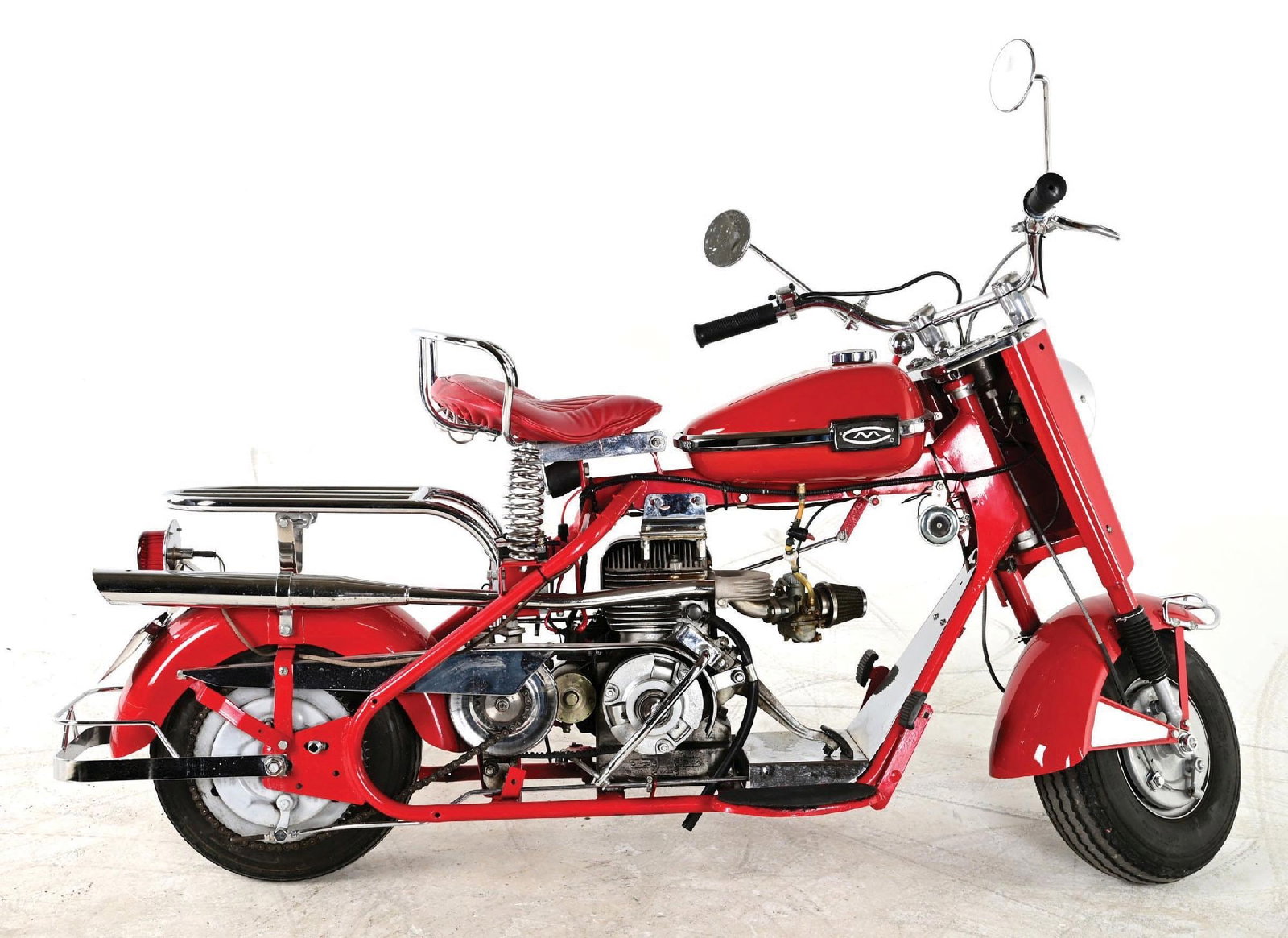 1962 CUSHMAN EAGLE MOTOR SCOOTER: In 1949, after the war, Cushman introduced the Eagle, its most popular model ever. It was designed as a scooter with the styling cues of large American-made motorcycles of the era, such as Harley-Davi