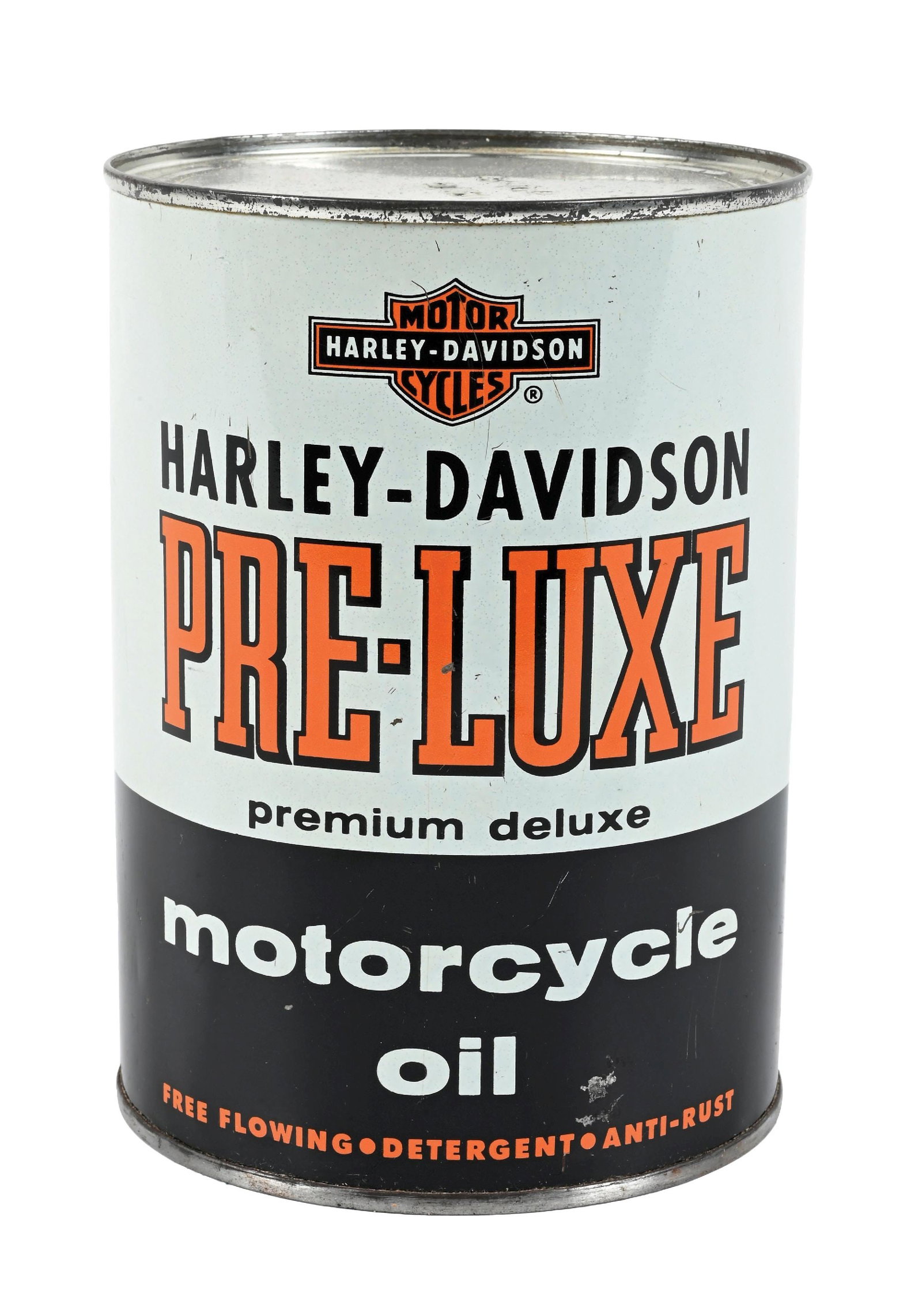 HARLEY-DAVIDSON PRE-LUXE MOTORCYCLE OIL ONE QUART CAN: One Quart Can. C. 1970s. CONDITION: Bright color & gloss throughout showing some minor areas of light surface scratches and paint wear. Can shows a crimped seam and is full. A well displaying example.