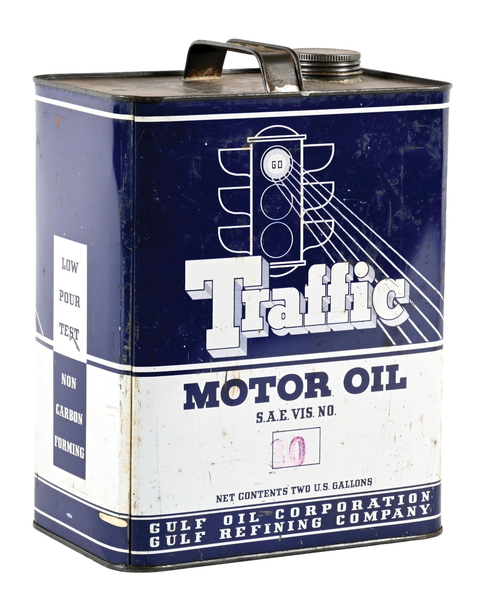 TRAFFIC MOTOR OIL TWO GALLON CAN W/ STOPLIGHT GRAPHIC.: Two Gallon Can. C. 1950s. CONDITION: Excellent color & gloss throughout showing some light surface wear and scratching with clean graphic. Backside showing heavier scratches, some of which appear remo