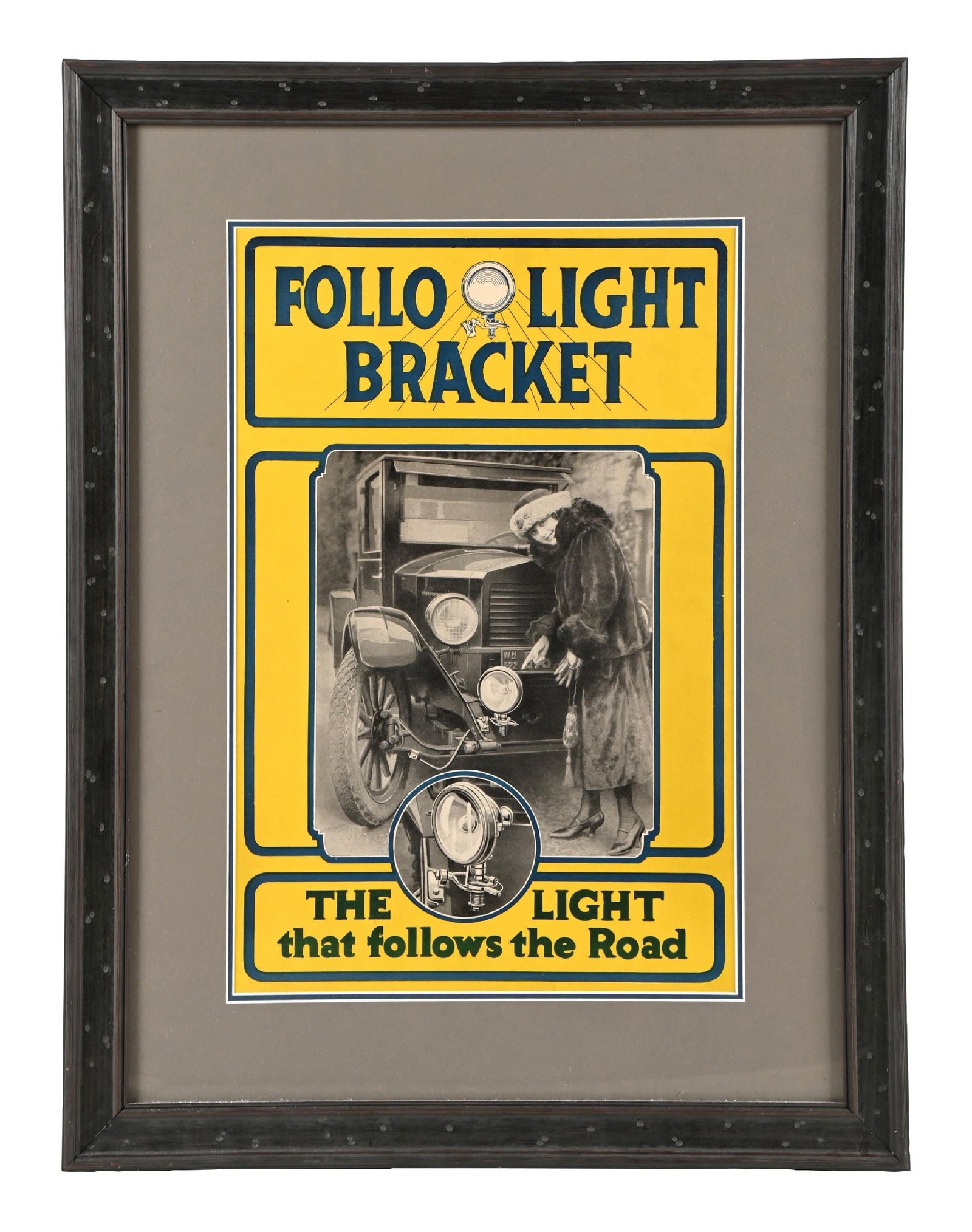 FOLLOW LIGHT BRACKET FRAMED AUTOMOTIVE STORE DISPLAY POSTER: Single-Sided Framed Cardstock Poster. C. 1920s. Featuring an excellent condition early graphic of woman automobilist displaying the Follo Light Automotive Accessory Light. CONDITION: Brilliant conditi