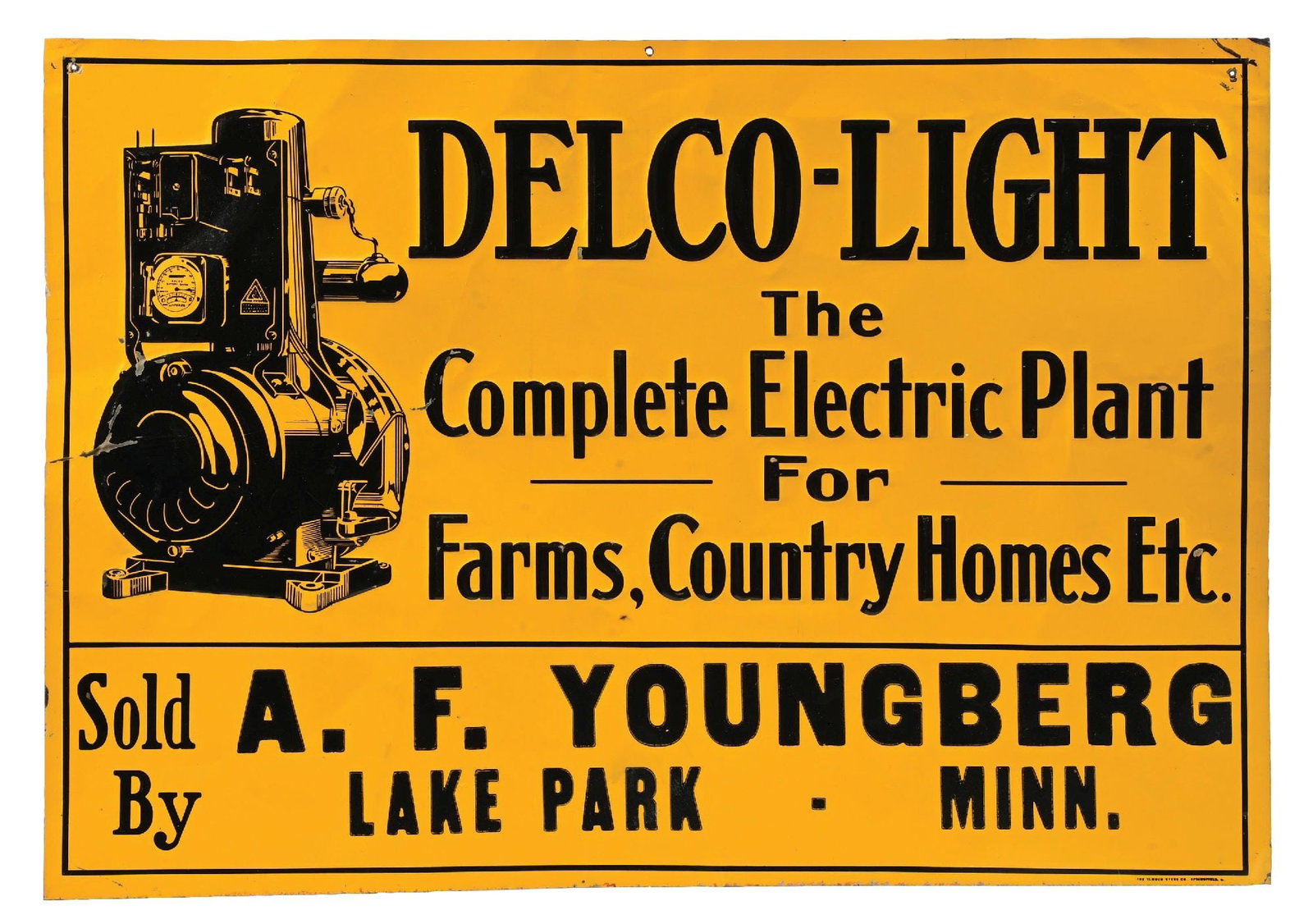 DELCO-LIGHT THE COMPLETE ELECTRIC PLANT EMBOSSED TIN SIGN: SST. C. 1920s. Marked Elwood Myers Co., Springfield, Ohio. CONDITION: Excellent color & gloss throughout showing light surface wear with areas of crinkling to the metal. Light paint loss at the mounti