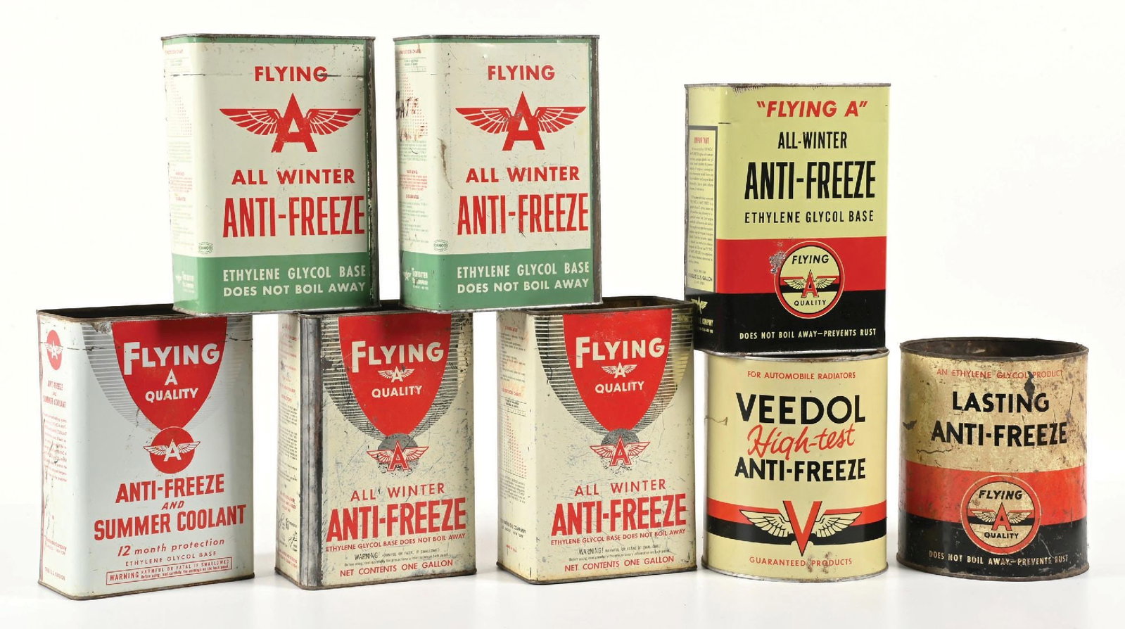 COLLECTION OF 8: FLYING A ANTI-FREEZE ONE GALLON CANS: Collection Consists Of: Eight individual one gallon cans from Flying A Anti Freeze. Each showing moderate wear with the square cans all having their lids removed. High Test can showing both of its ori
