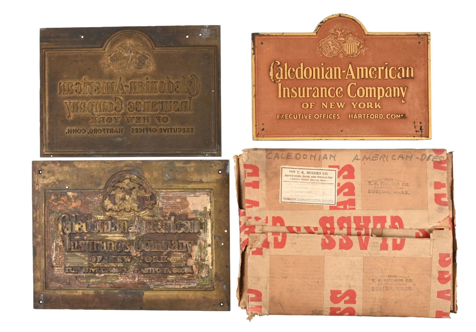 CALEDONIAN-AMERICAN INSURANCE COMPANY OF NEW YORK BRASS SIGN W/ ORIGINAL MOLD AND BOX: In original shipping box from T.K. Hughes Co., Boston, Massachusetts. This piece showing three individual pieces, a pressed board sign, and two brass stamping plates. CONDITION: Each in excellent orig
