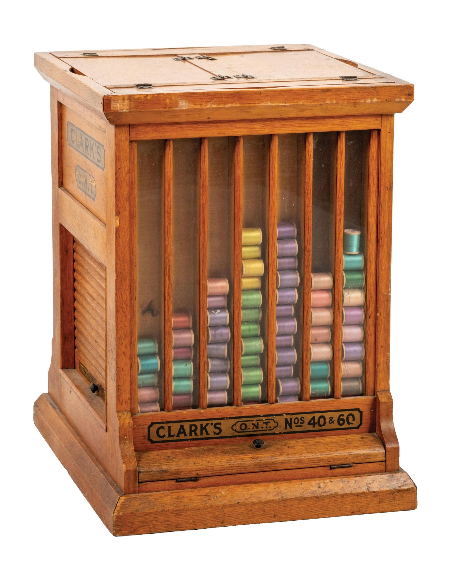 CLARK'S O.N.T SILK SPOOL THREAD CABINET: CONDITION: Showing all original labeling and original finish to the oak cabinet, working rolltop sides, comes complete with some spools of thread. Showing light wear overall with some scuffs and scrap