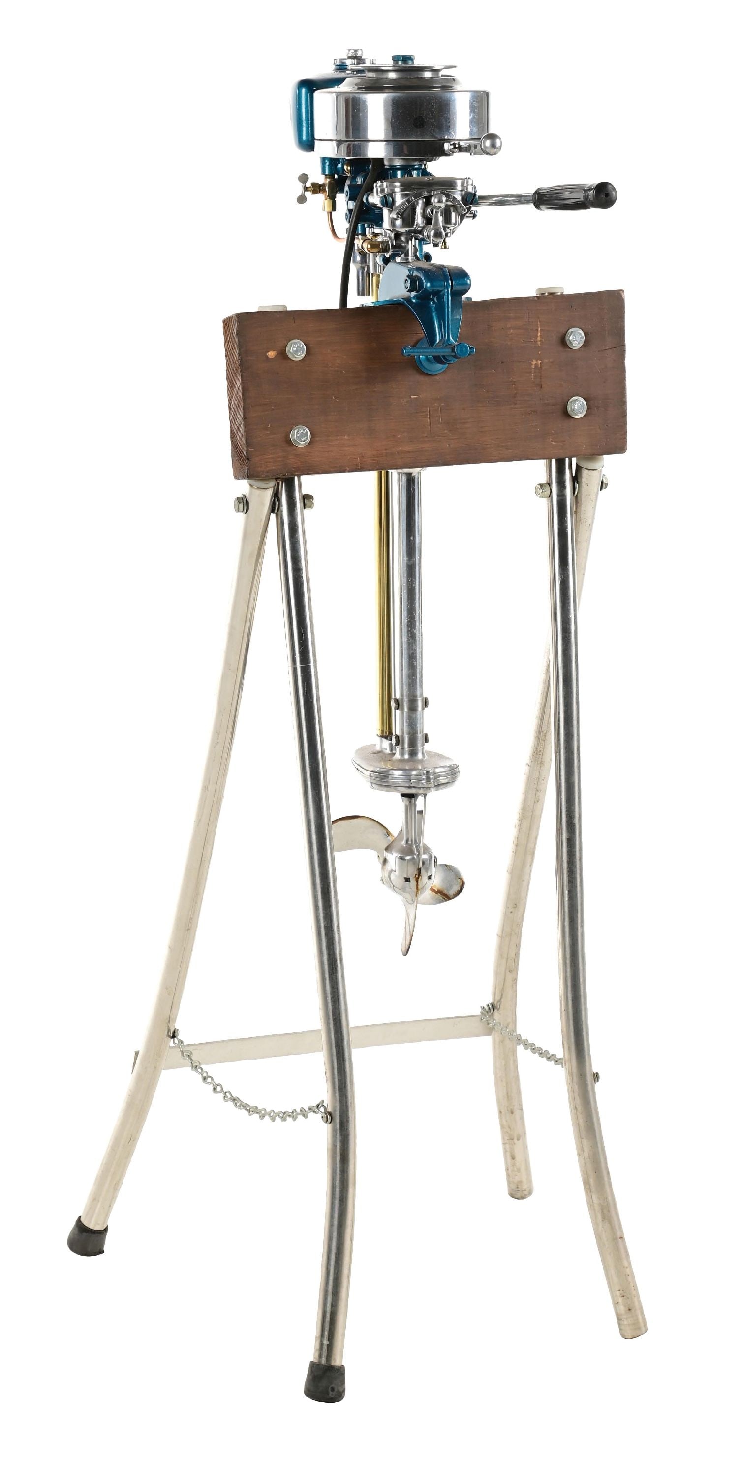 EVINRUDE ELTO "PAL" OUTBOARD CANOE MOTOR: CONDITION: Showing a fully restored motor with new paint, new polished chrome and brass components, mounted on an outboard motor stand. This is not a standard shippable item and will require 3rd