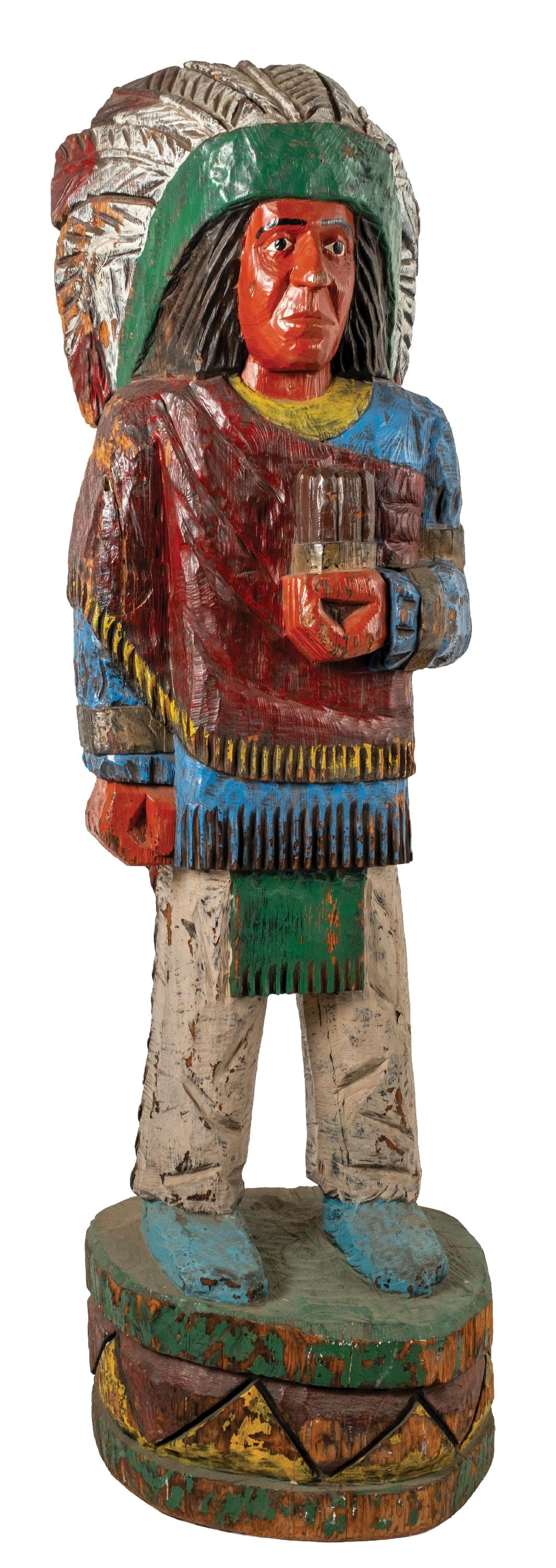 WOODEN COLORFUL PAINTED NATIVE AMERICAN STATUE: A wooden cigar store carving of a Native American with original paint. This particular mid-century carving shows very nicely. CONDITION: There are areas of scuffs, scrapes, and dings consistent with a