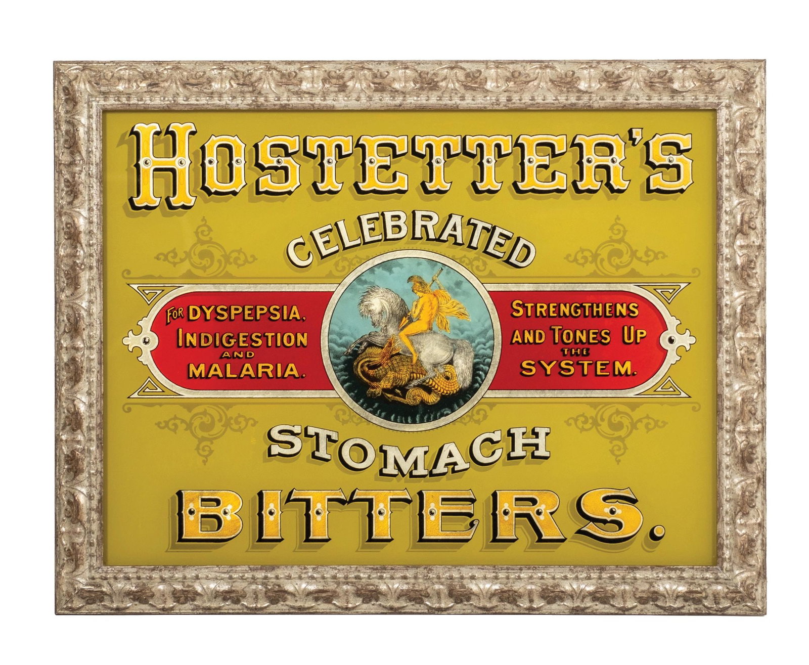 HOSTETTER'S REVERSE ON GLASS ADVERTISEMENT: A reverse on glass sign in a period frame, reading "Hostetter's Celebrated Stomach Bitters.", "For Dyspepsia, Indigestion and Malaria. / Strengthens and Tones Up the System." and showing iconic warrio