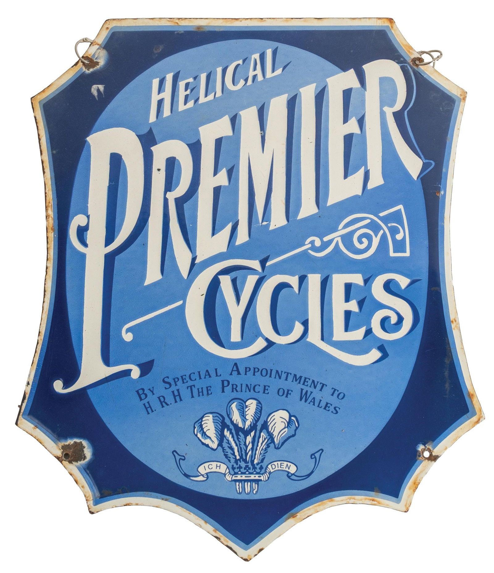 PORCELAIN DIE-CUT SIGN ADVERTISING HELICAL PREMIER CYCLES: CONDITION: Single-sided porcelain showing good color and shine, with moderate edge wear to all edges, light chipping at the mounting holes, some light surface rust at the edge wear. No significant are