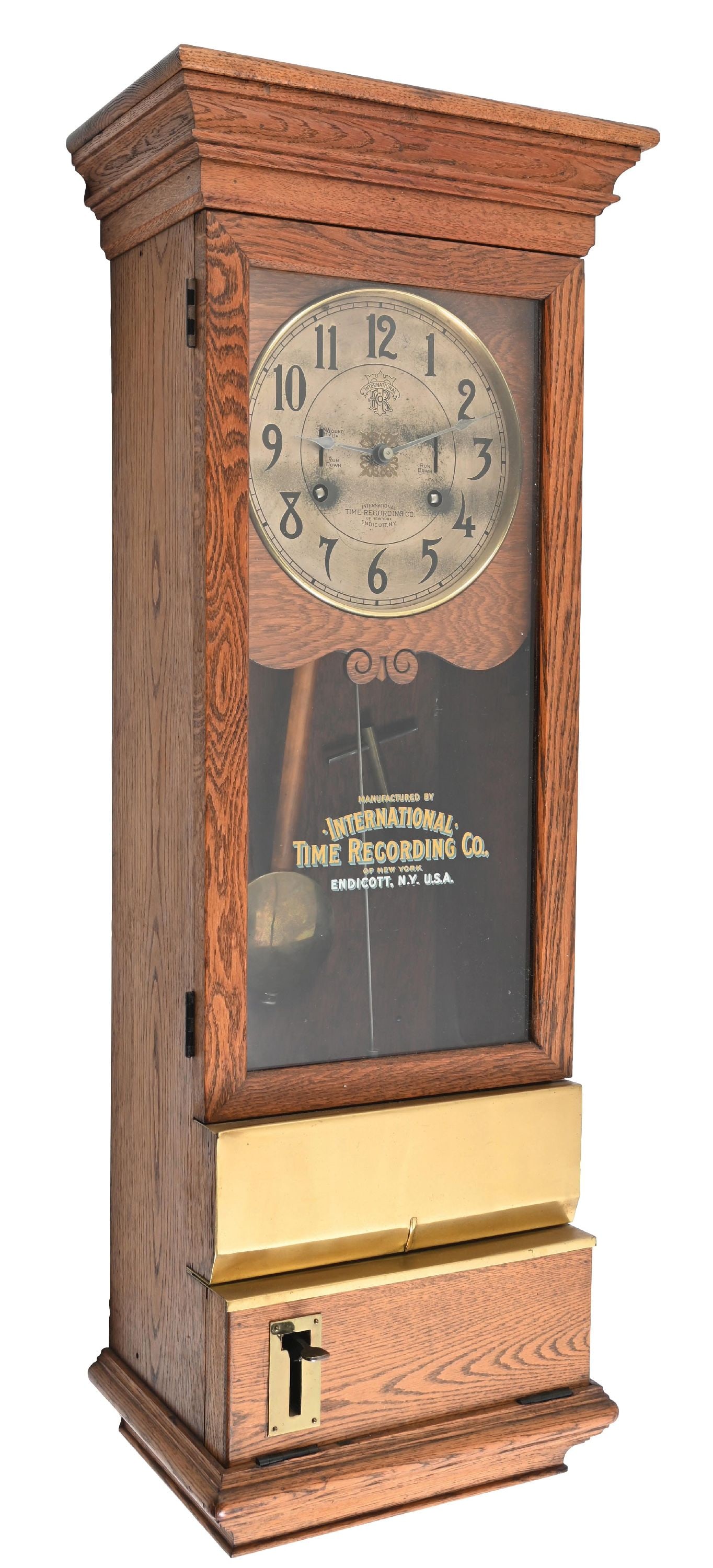 INTERNATIONAL TIME RECORDING CO.TIME CLOCK: An early time clock from the International Time Recording Company out of Endecott, New York. CONDITION: Shows oak construction, with all the internal components. The front original glass is noted for
