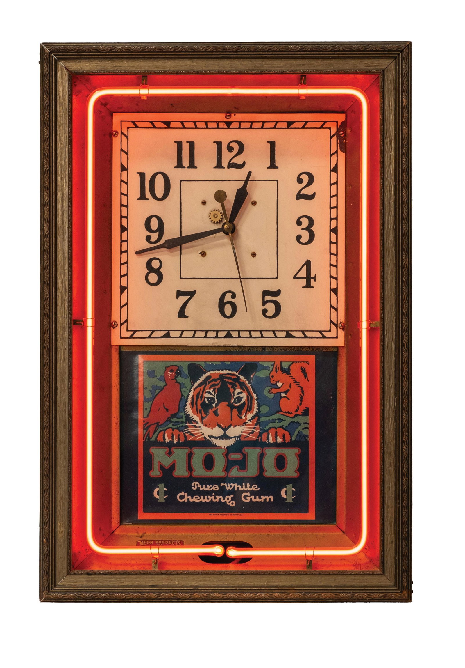 AN ORIGINAL NEON WALL CLOCK W/ ADDED MO-JO CHEWING GUM ADVERTISING: CONDITION: Showing original can with original front frame, original face and hands, with Mo-Jo Pure White Chewing Co. advertising in the bottom panel. Showing wear overall, areas of missing paint, and