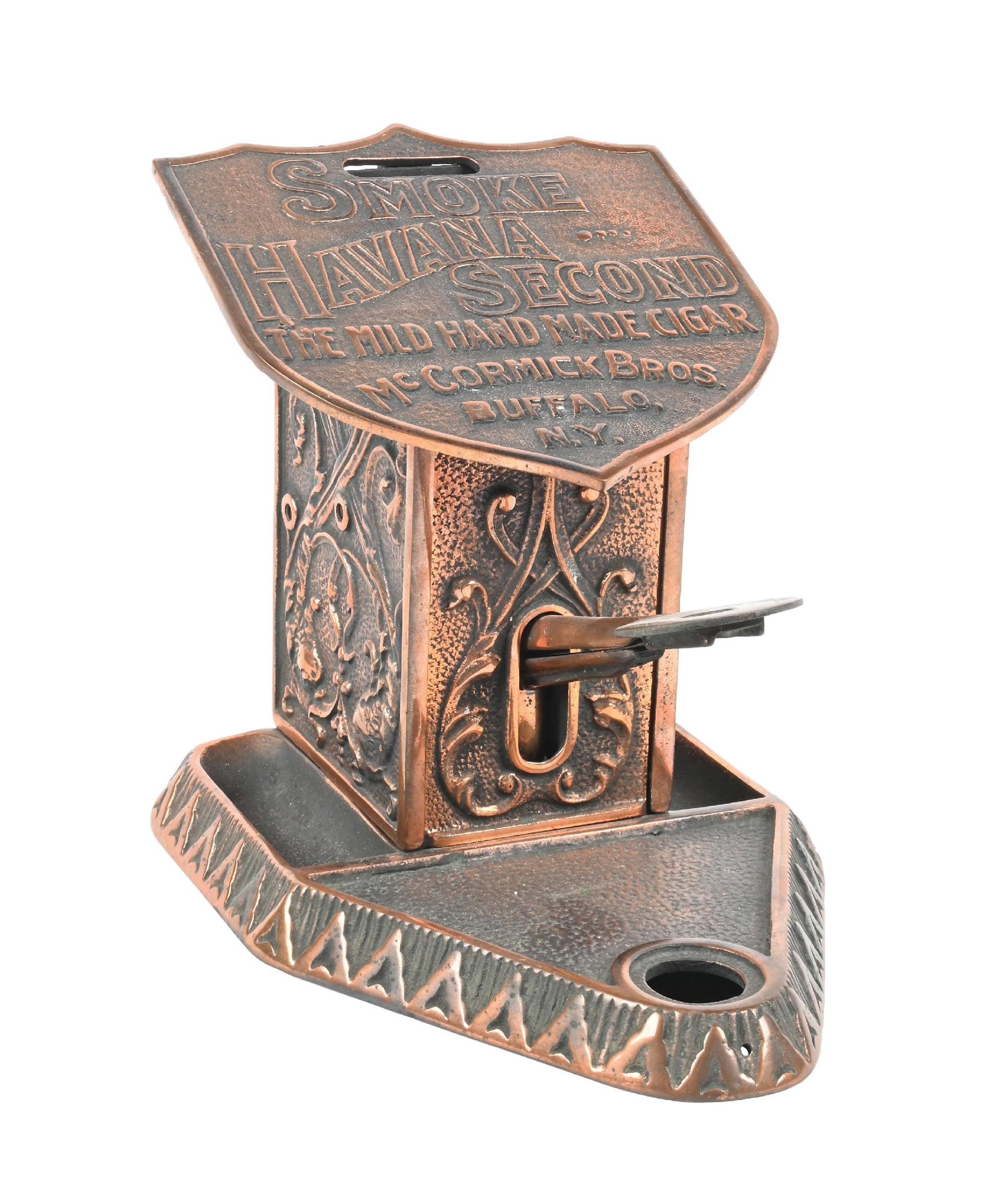 SMOKE HAVANA IRON CIGAR CUTTER AND MATCH DISPENSER: CONDITION: Showing new copper flash plating overall with light wear. When the front lever is depressed to nip your cigar, it pushes a match out through the hole in the lid, and when the match is pulle