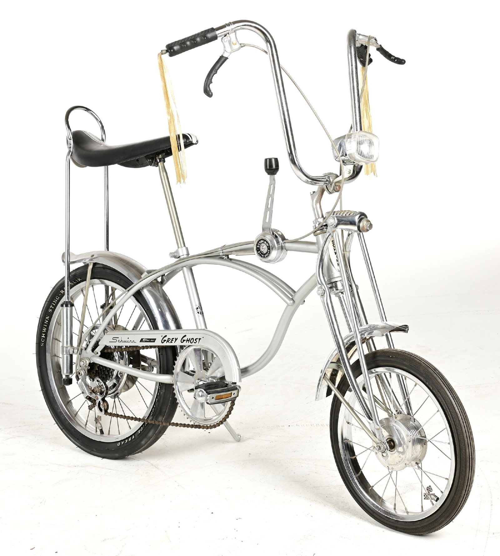 SCHWINN "GREY GHOST" STING-RAY BICYCLE SERIAL NO. BG004968: CONDITION: Showing an older restoration to the Schwinn Grey Ghost bicycle, showing correct saddle, correct handlebars, added handle brakes, correct shifter, and chain guard. Showing some oxidation, pr