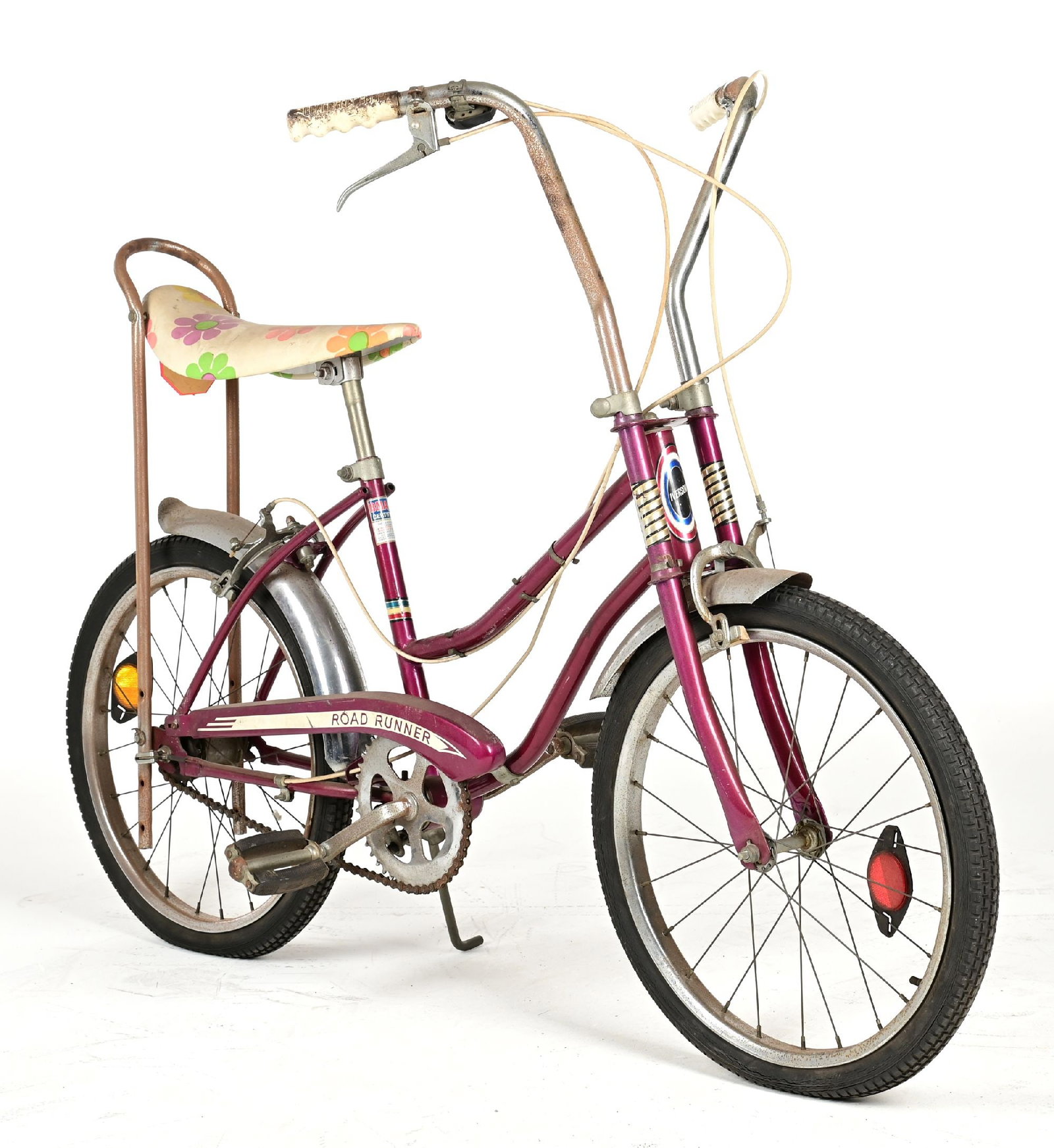 IVERSON ROAD RUNNER 20" GIRL'S BICYCLE: CONDITION: Showing original violet paint with original saddle, handlebars, grips, handbrakes, and chain guard. Showing moderate road wear with areas of scuffs, scrapes, and oxidation, primarily to the