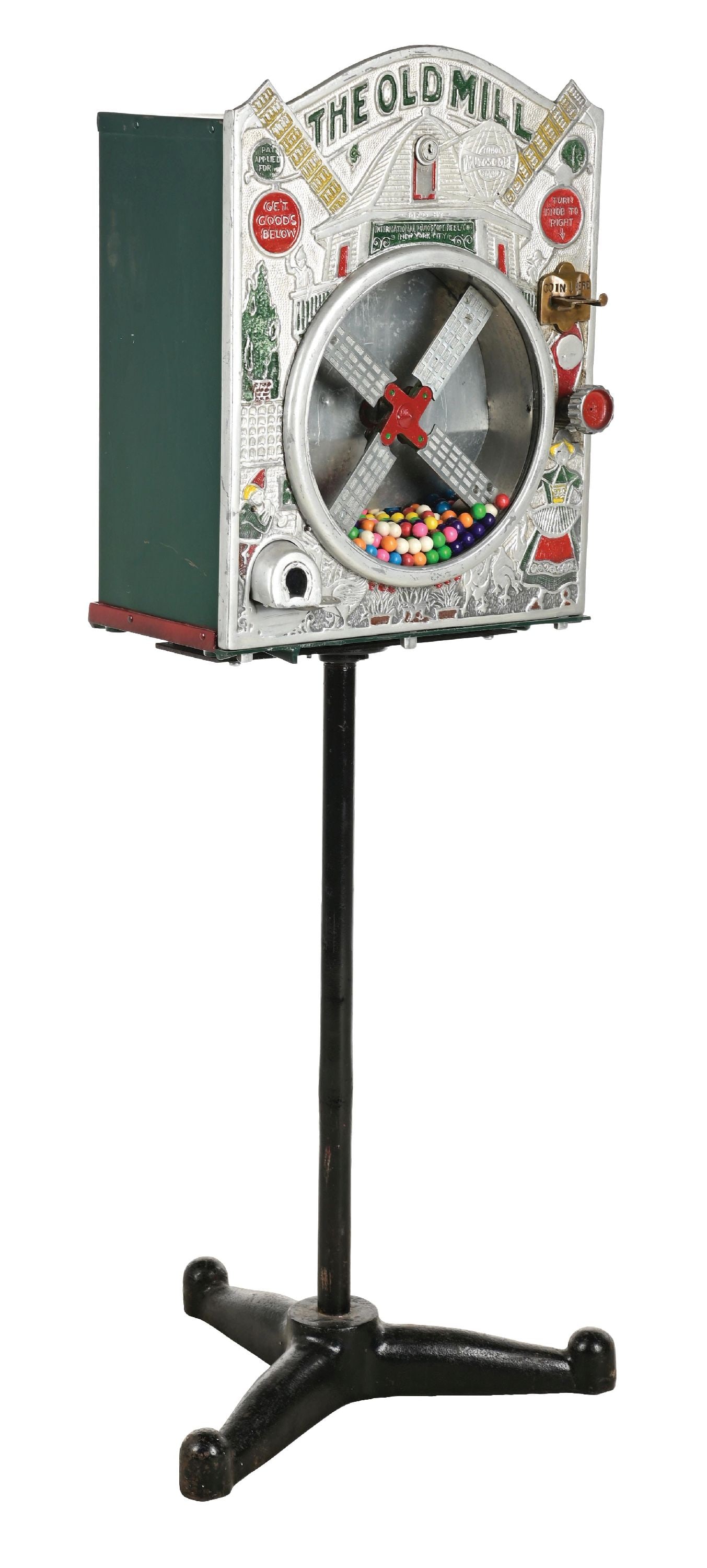 1¢ INTERNATIONAL MUTOSCOPE "THE OLD MILL" CIRCUS "SCOOP" VENDING MACHINE: C. 1925. The International Mutoscope Reel Co. CONDITION: Showing an older park paint to the tin box and original plating to the hardware. It has original older paint to the front casting. It has an or